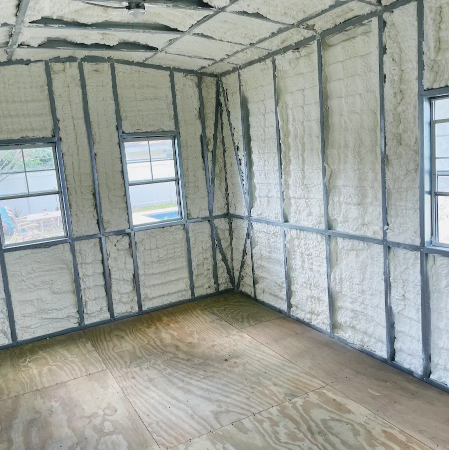 Closed-cell spray foam insulation applied to wall cavities in a residential project in California Polytechnic State University